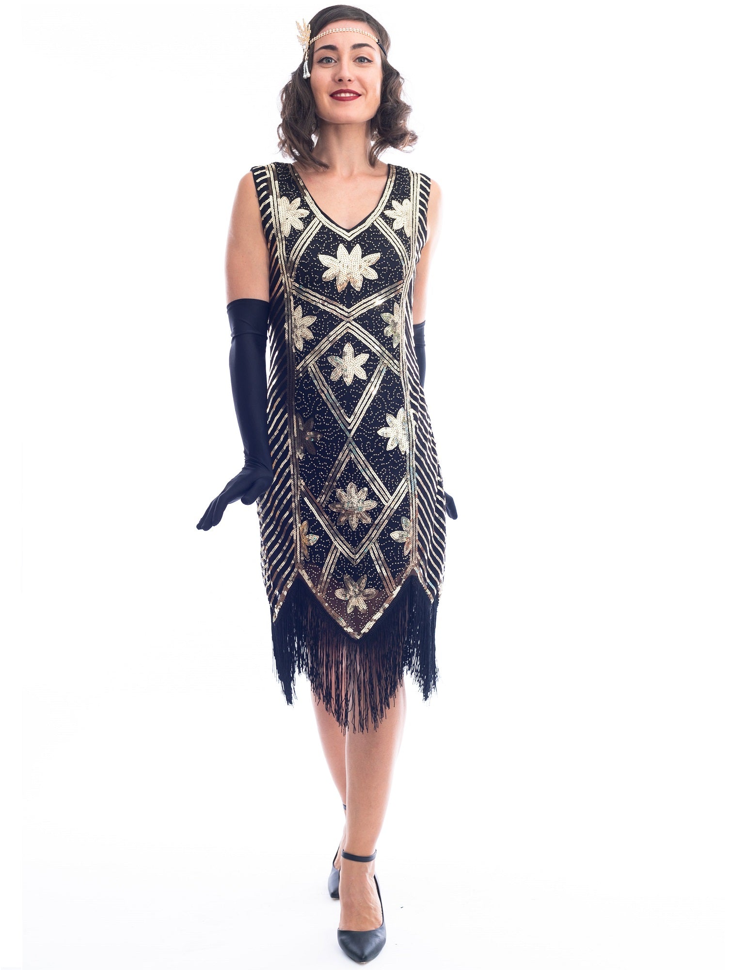 A 1920s black and gold flapper dress with sequins and floral pattern 