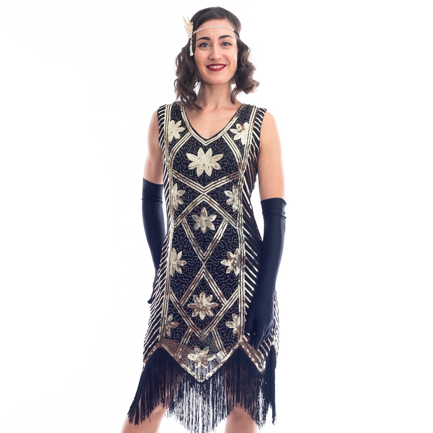 A 1920s black and gold flapper dress with sequins and floral pattern 