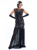 A long black flapper dress with black sequins and silver beads