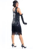 A Black Flapper Dress with black sequins, silver beads and fringes around the hem - Back View