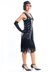 A Black Flapper Dress with black sequins, silver beads and fringes around the hem - Side View