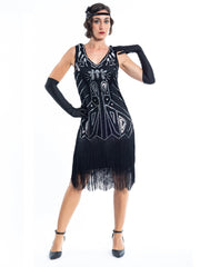 A Black Flapper Dress with black sequins, silver beads and fringes around the hem