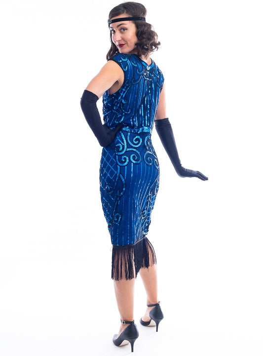 A side view 1920s Blue Flapper Dress with blue sequins, black beads and fringes around hem