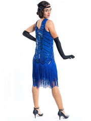 A blue flapper dress with sequins, beads and fringes around the hem - Back View