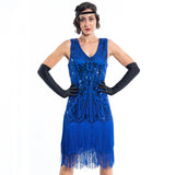 A blue flapper dress with sequins, beads and fringes around the hem - Close View