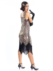 A vintage 1920s gatsby dress that is cashmere in colour