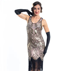A vintage 1920s gatsby dress that is cashmere in colour