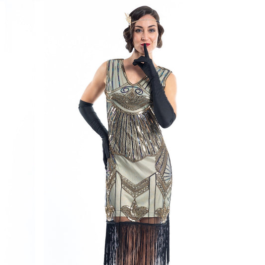 A gold flapper dress with a 1920s deco pattern of sequins, beads and fringes around the hem - Close View