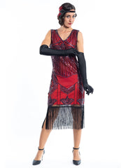 A red flapper dress with a 1920s deco pattern of sequins, beads and fringes around the hem