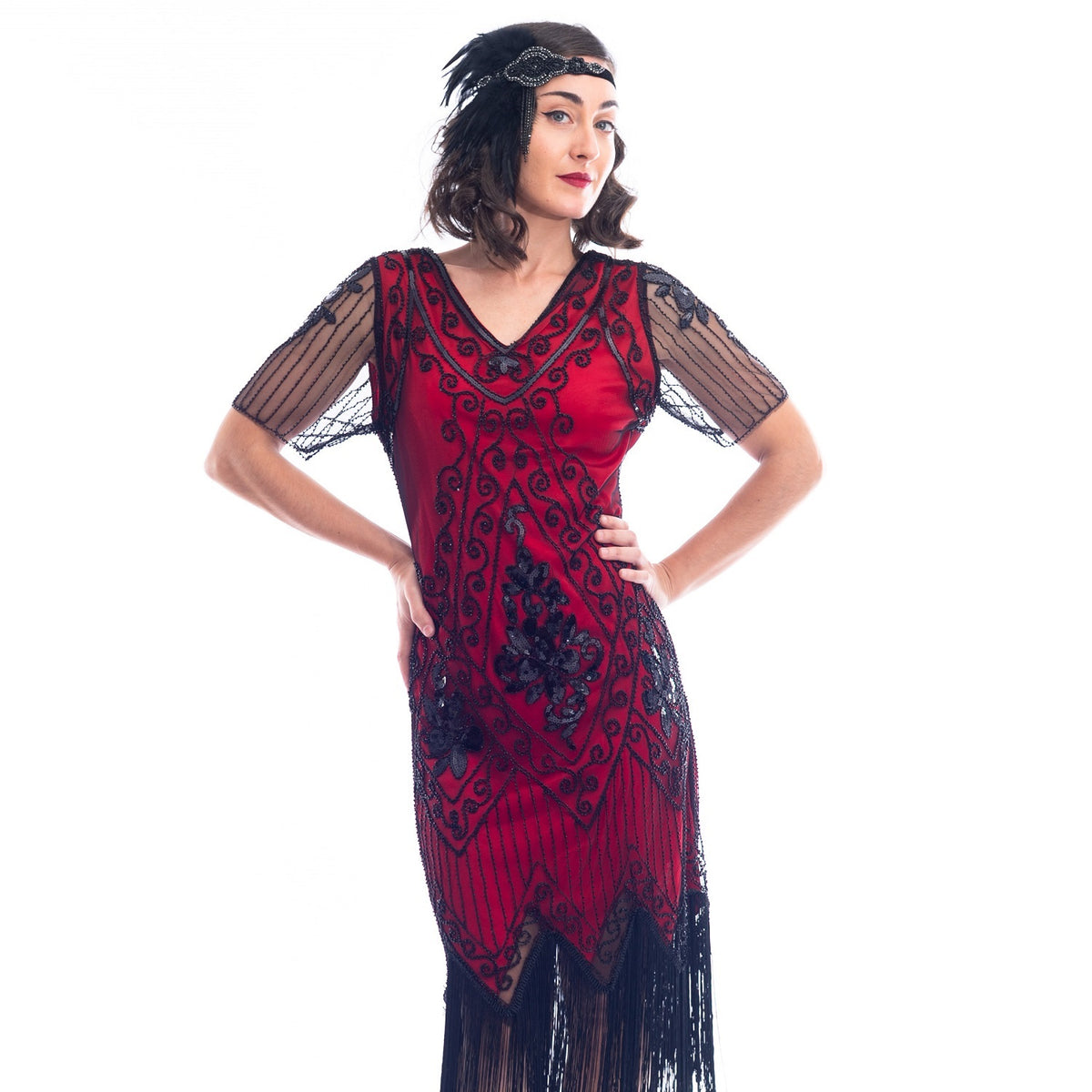 A close view of a burgundy red 1920s Flapper Dress with black beads, sequins, sheer sleeves and black fringes