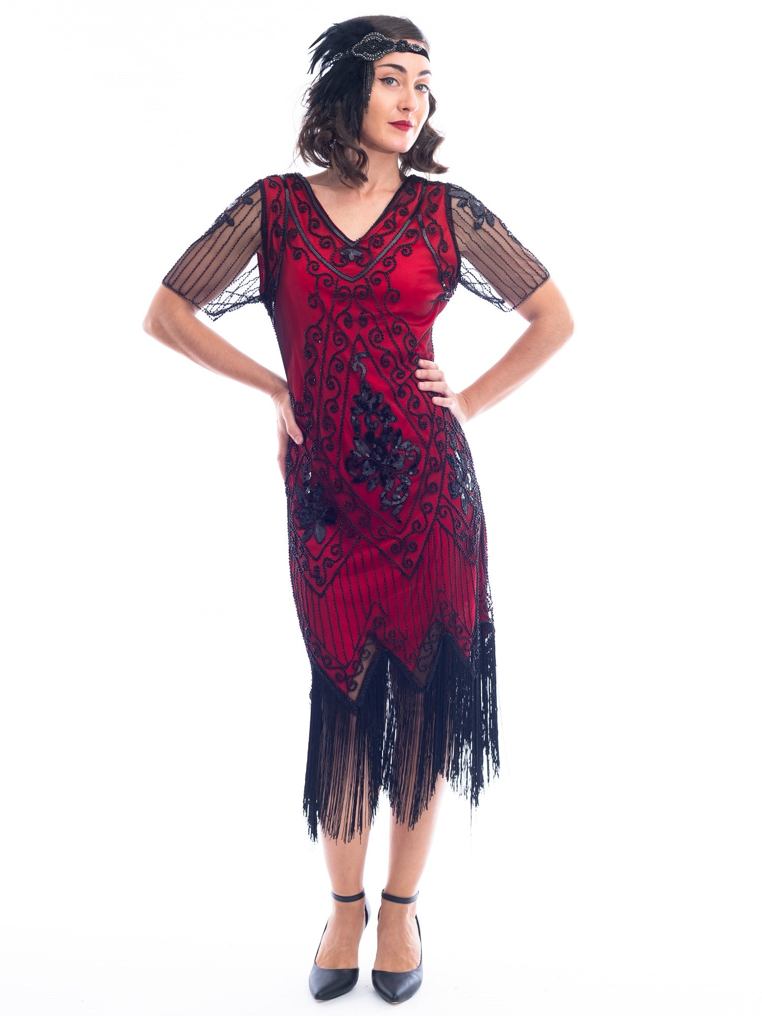 A burgundy red 1920s Flapper Dress with black beads, sequins, sheer sleeves and black fringes