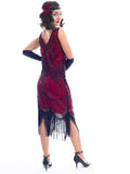 A back view of a Red 1920s Flapper Dress with black beads & fringes around the hem