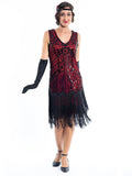 A 1920s Red Flapper Dress with Black Sequins and a double layer of fringes around the hem