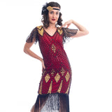 A close view of a vintage red 1920s Flapper Dress with gold beads & black sequins