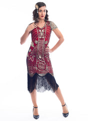 A Red 1920s Gatsby Dress with gold beads, gold sequins and black fringes around hem