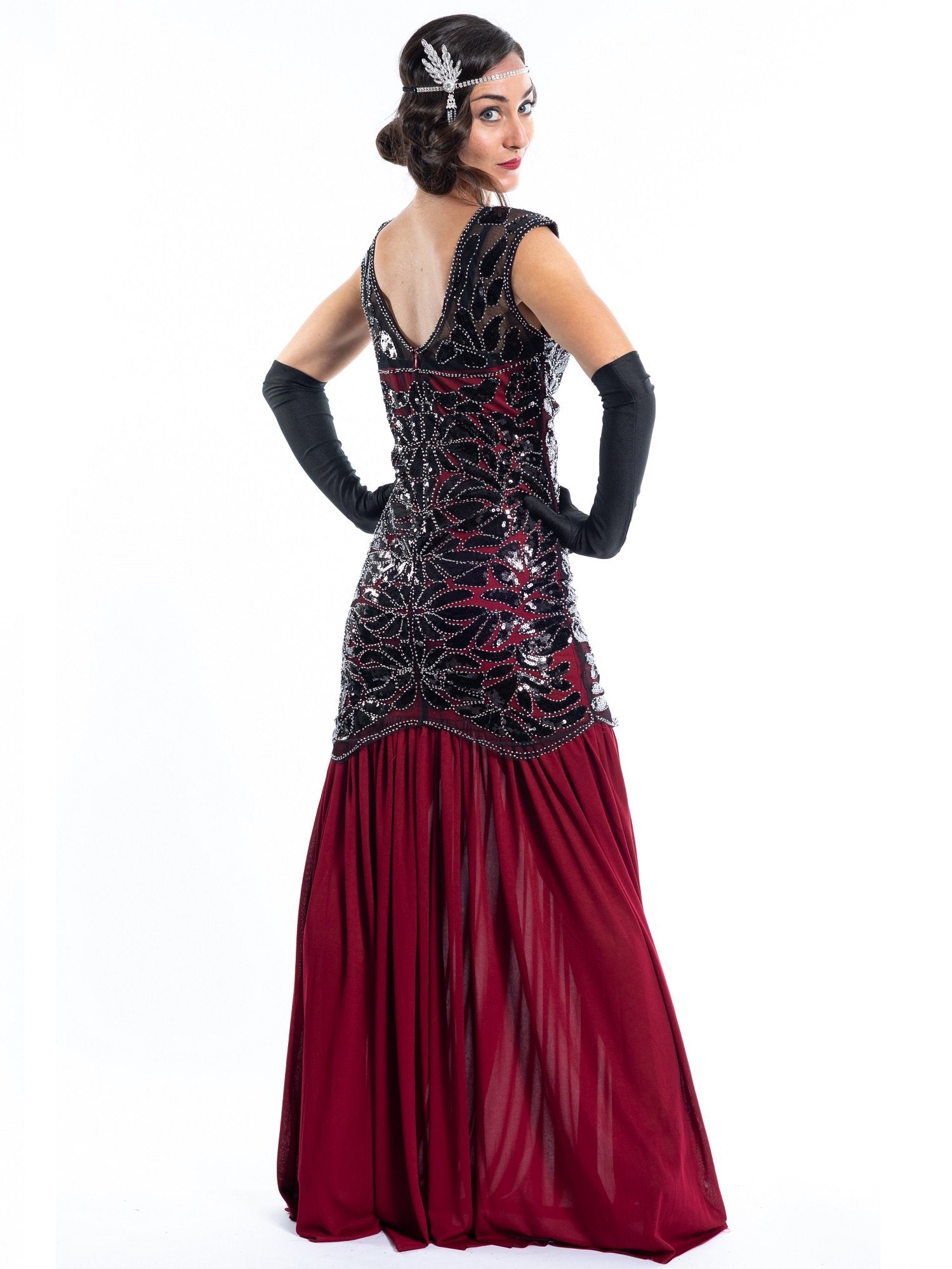 A long red flapper dress with black sequins and silver beads