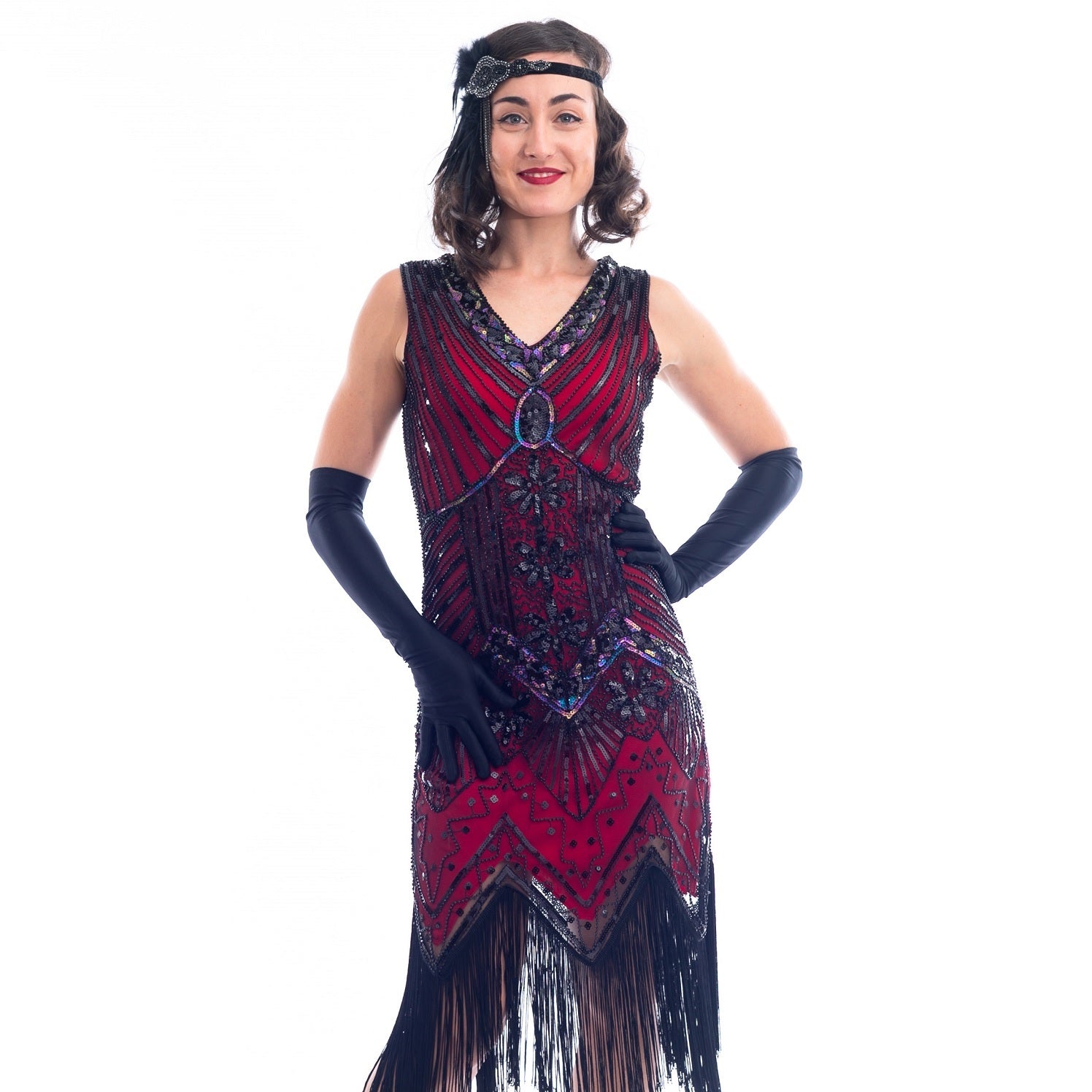 A close view of a Vintage Red 1920s Flapper Dress with black beads, black sequins & fringes around the hem