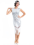A white flapper dress with silver sequins, beads and white fringes around the hem